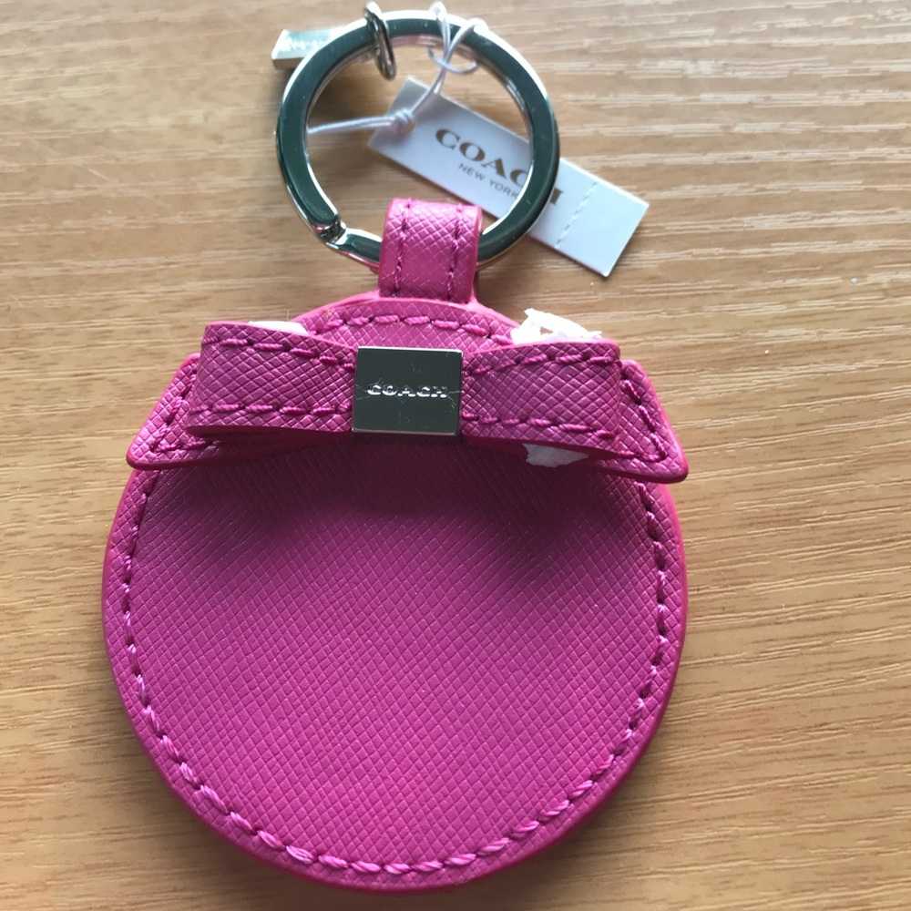 Brand new *COACH* leather key charm with a mirror in protective peel off plastic